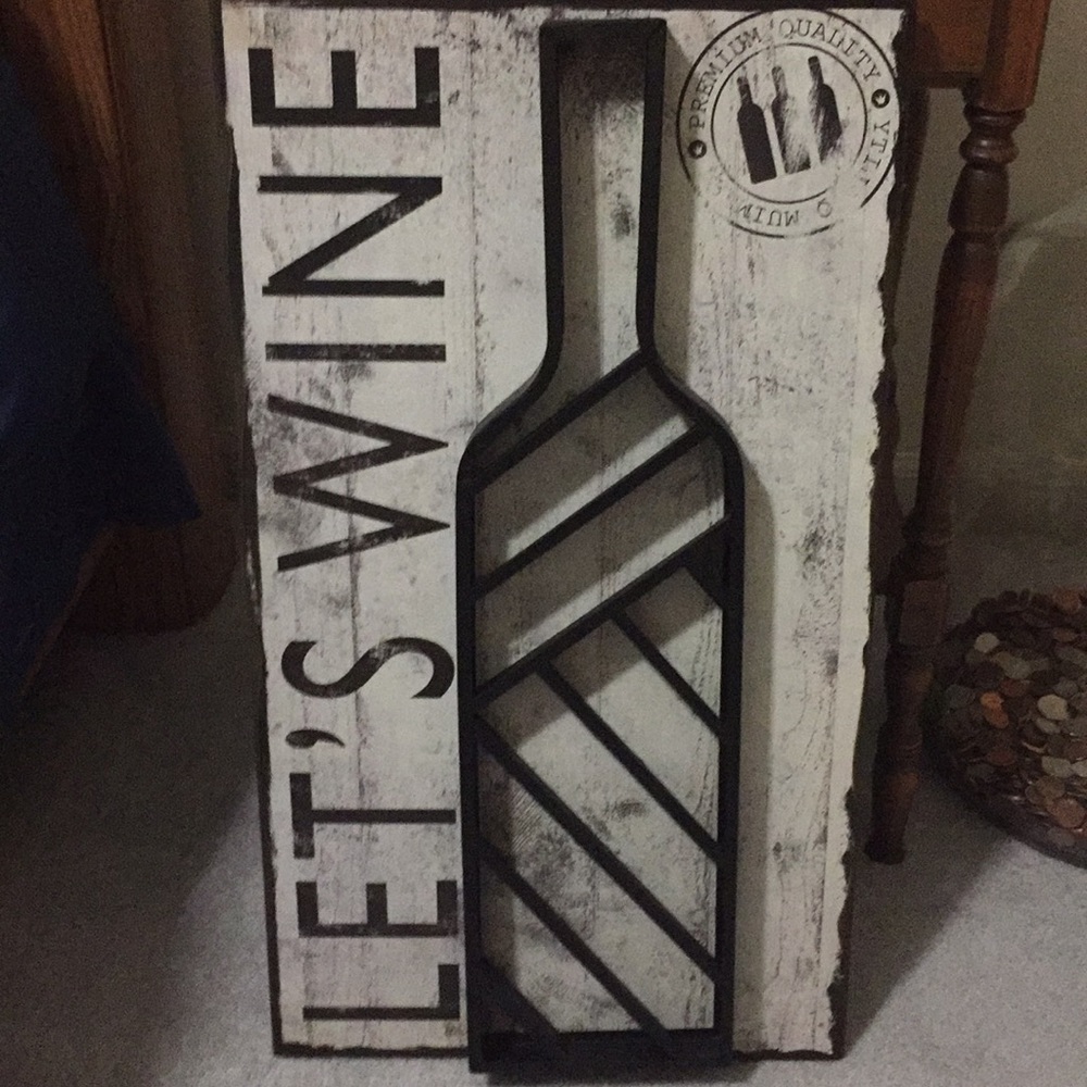 Wine cork collecting wall hanging.